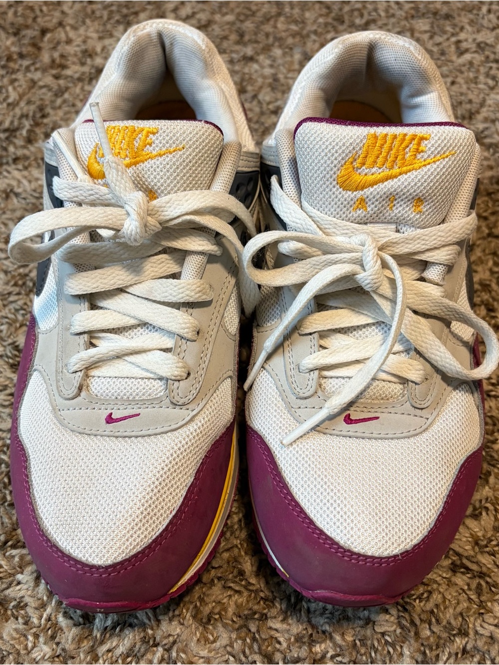 Nike White Athletic Sneakers with Purple and Yellow Accents